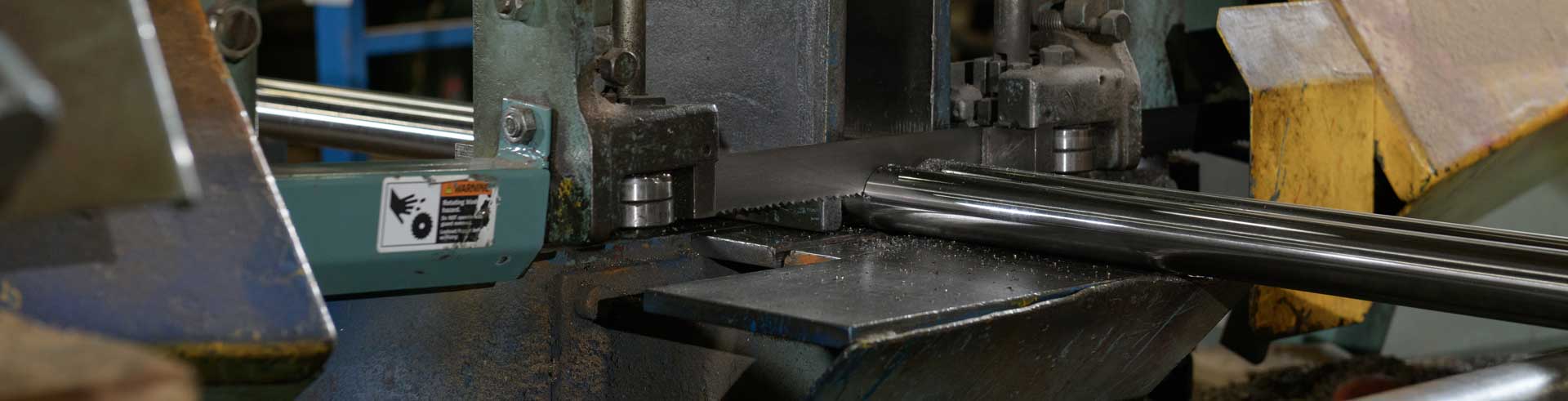 sawing metal bar