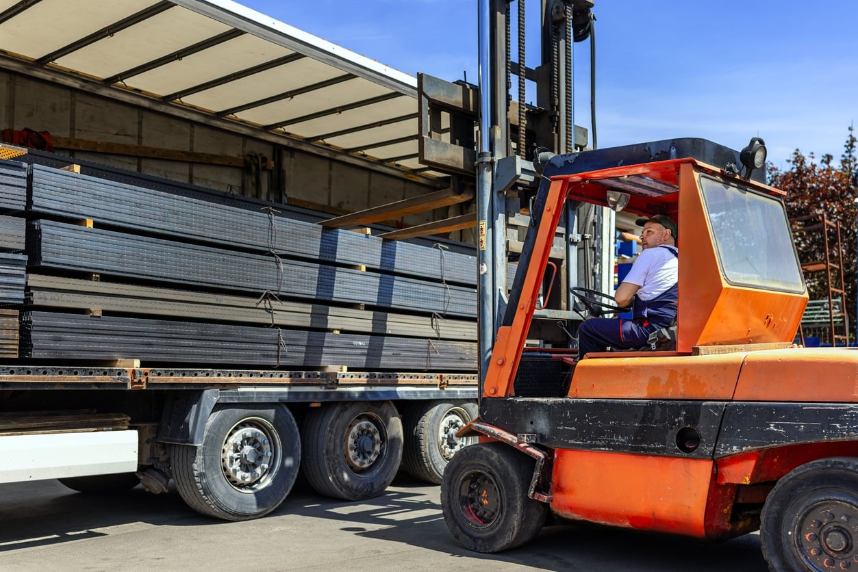 Steel Product loaded to a flat bed and ready for delivery.